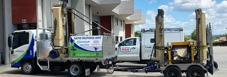 Portable heavy vehicle hoists ready for delivery to customer for use in lifting trucks, cars, rail and bux.